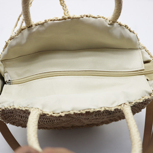 Runde, geflochtene Handtasche