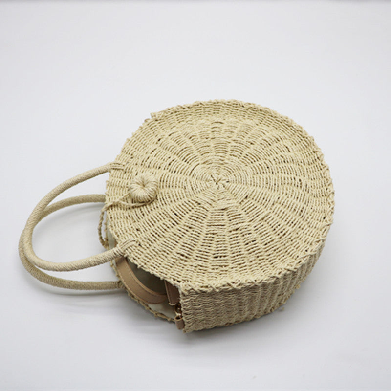 Runde, geflochtene Handtasche