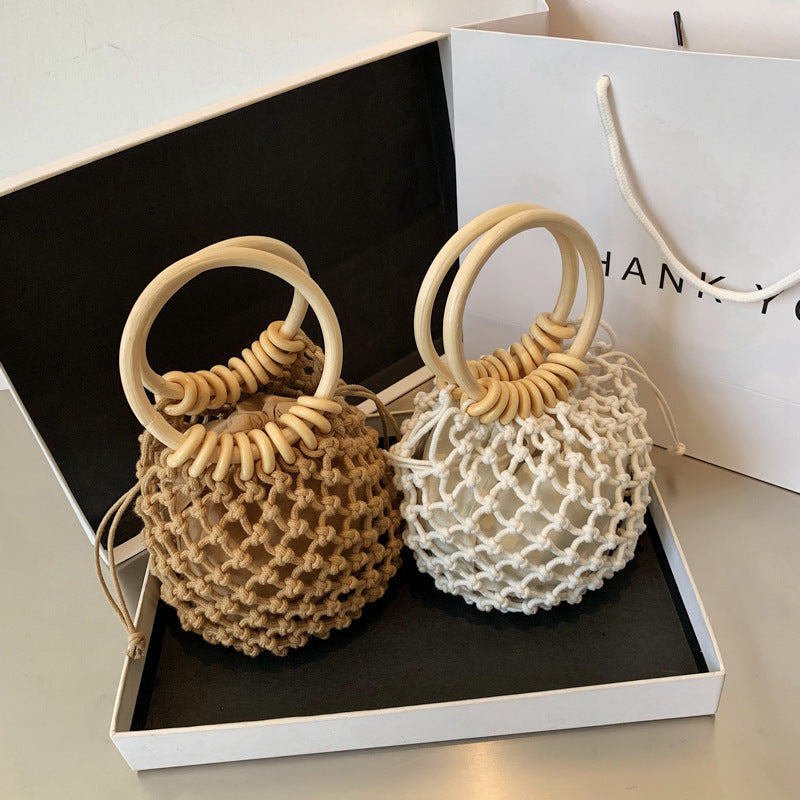 Geflochtene, trendige, kleine Handtasche