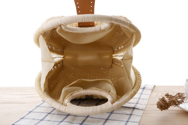 Runde, modische Rattan-Handtasche