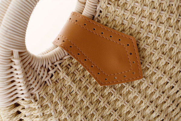 Runde, modische Rattan-Handtasche