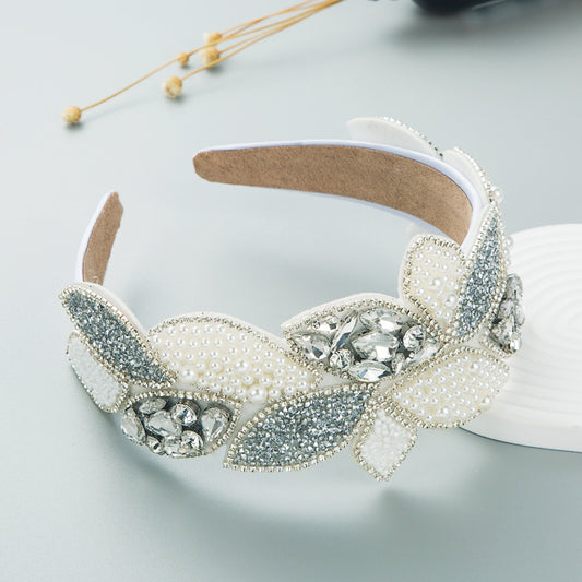 Haarreifen mit Strass- und Perlenverzierung