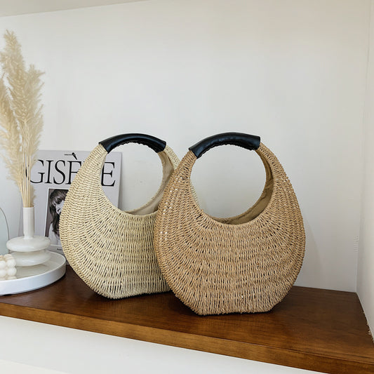 Modische, ovale Handtasche